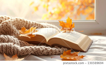 Reading time wrapped in a blanket Autumn relaxation background Reading time wrapped in a blanket Autumn relaxation background 130389694