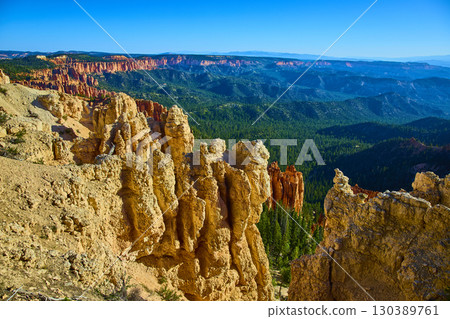 Bryce Canyon Hoodoo Formations Overlooking Pine Forest and Distant Plateau Bryce Canyon Hoodoo Formations Overlooking Pine Forest and Distant Plateau 130389761