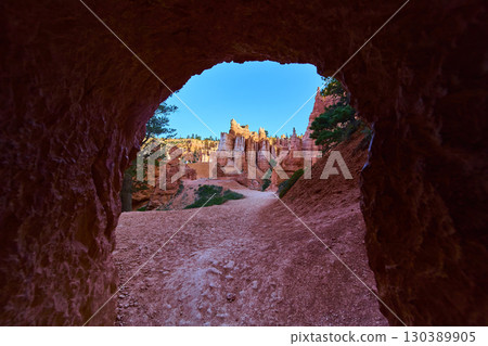Bryce Canyon Tunnel Trail View With Hoodoo Formations And Bright Blue Sky 130389905