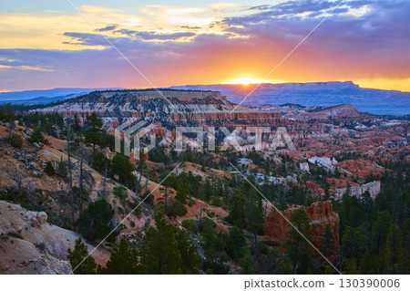 Sunrise Golden Hour Over Hoodoos and Pine Trees in Bryce Canyon National Park 130390006