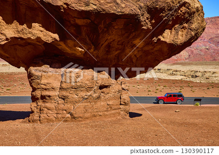 Sandstone Formation Red Jeep Desert Road Motion Ground Level Perspective Sandstone Formation Red Jeep Desert Road Motion Ground Level Perspective 130390117