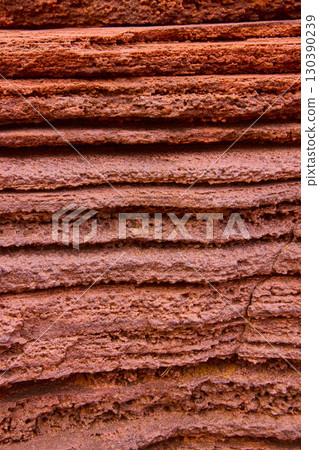 Sedimentary Rock Layers and Rugged Texture with Subtle Motion Eye Level Close Up 130390239
