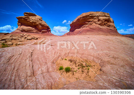 Red Rock Formations and Swirling Sandstone Patterns Desert Foreground Eye Level Red Rock Formations and Swirling Sandstone Patterns Desert Foreground Eye Level 130390306