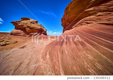 Sandstone Beehive Formation Striated Wall Sunlit Desert Floor Low Perspective Sandstone Beehive Formation Striated Wall Sunlit Desert Floor Low Perspective 130390312