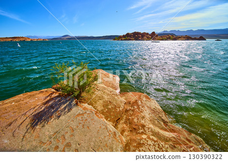 Sandstone Shoreline Turquoise Lake Red Rock Formations Eye Level Perspective 130390322