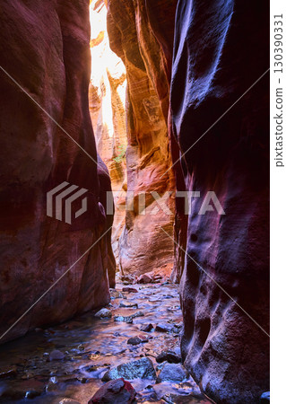 Slot Canyon Stream Flowing Between Red Sandstone Walls Eye Level Perspective 130390331