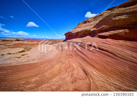 Red Sandstone Striations and Desert Plateau Motion Low Angle Perspective 130390383