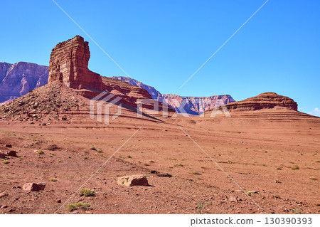 Red Sandstone Butte and Mesa in Desert Wilderness with Blue Sky Eye Level View 130390393