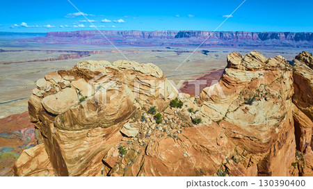 Aerial Fly Over Vermilion Cliffs Rugged Sandstone Mesas and Desert Plain Aerial Fly Over Vermilion Cliffs Rugged Sandstone Mesas and Desert Plain 130390400