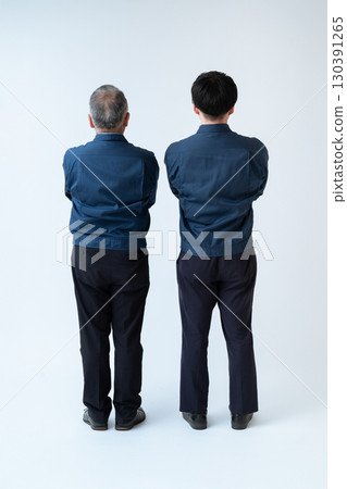 The backs of the engineers who support the site The backs of the engineers who support the site 130391265