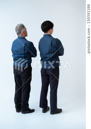 The backs of the engineers who support the site The backs of the engineers who support the site 130391266