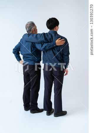 The backs of the engineers who support the site The backs of the engineers who support the site 130391270