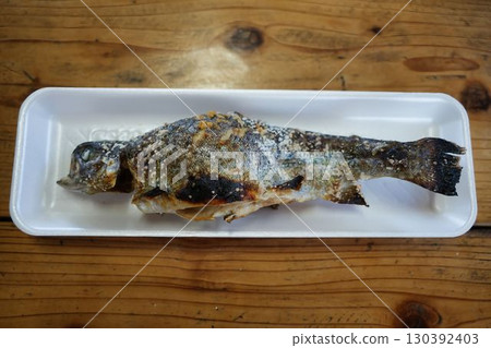 Charcoal grilled salted rainbow trout 130392403
