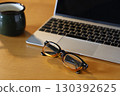 Reading glasses and laptop computers 130392625