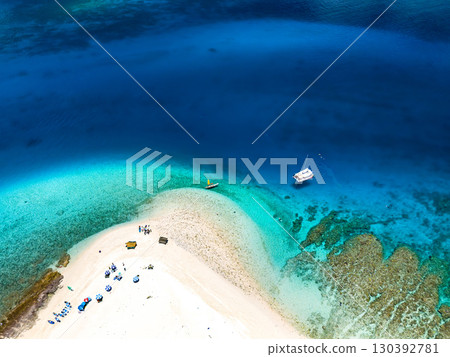 Drone footage of Kabi Island. Skin diving on a catamaran. Zamami Island, Kerama Islands, Shimajiri District, Okinawa Prefecture 130392781