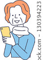 Senior woman operating a smartphone 130394223