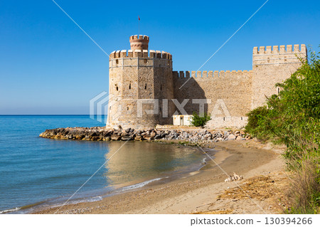Medieval stone fortress Mamure Kalesi on shore of Mediterranean Sea, Mersin, Turkey Medieval stone fortress Mamure Kalesi on shore of Mediterranean Sea, Mersin, Turkey 130394266
