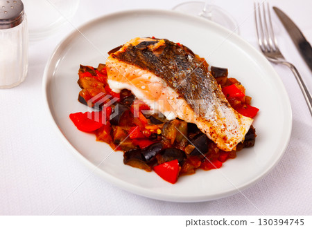 Appetizing salmon with stewed vegetables Appetizing salmon with stewed vegetables 130394745