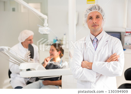 Adult male nurse in dental office Adult male nurse in dental office 130394909