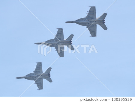 U.S. Navy F/A-18 Super Hornets flying in formation 130395539