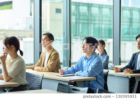 People attending lectures People attending lectures 130395931