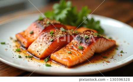 Fine Dining Presentation of Gourmet Salmon with Mediterranean Flavors 130396328