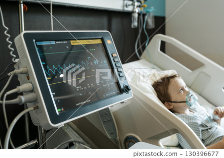 Child Patient Lying in Hospital Therapy Room Child Patient Lying in Hospital Therapy Room 130396677