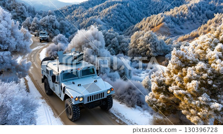 Military Vehicles Navigate Snowy Mountain Road in Winter, Highlighting Cold Climate Transportation Challenges Military Vehicles Navigate Snowy Mountain Road in Winter, Highlighting Cold Climate Transportation Challenges 130396728