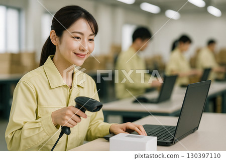 A woman scanning and verifying products 130397110