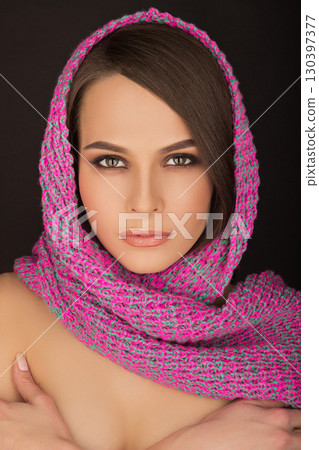portrait of beautiful girl with a scarf on her head 130397377