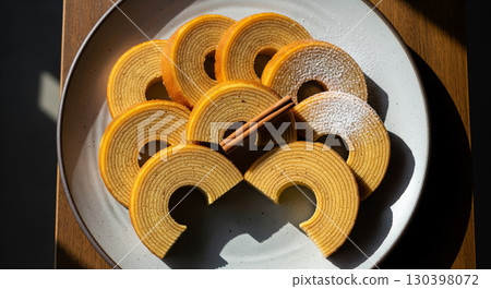 Sliced Baumkuchen with Cinnamon and Powdered Sugar, Top View 130398072