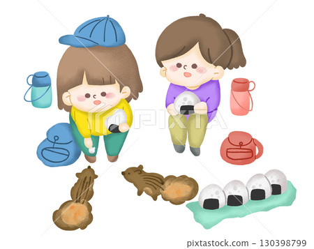Children enjoying a picnic with packed lunches 130398799