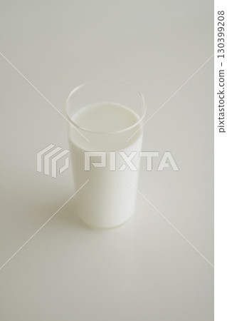 A glass of milk in the soft light of a summer afternoon 130399208