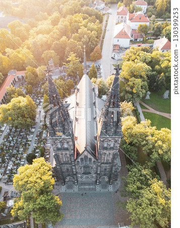 Morning sun illuminates the stunning Vysehrad Basilica of St. Peter and St. Paul in Prague. Morning sun illuminates the stunning Vysehrad Basilica of St. Peter and St. Paul in Prague. 130399253