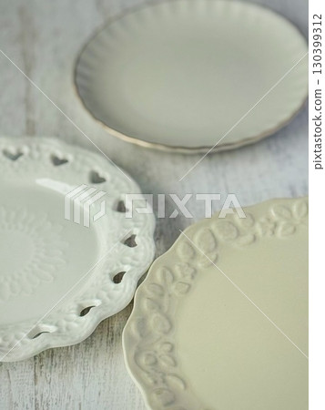 Three cute white plates Three cute white plates 130399312