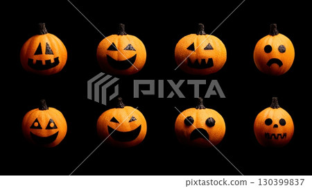 Variety of Halloween Jack-o-Lantern Faces on Black Background 130399837
