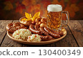 Assorted German sausages, salted pretzels and coleslaw with a and refreshing cold foamy light beer on a rustic table. In the background are bright autumn leaves. Festive food concept for Oktoberfest. 130400349
