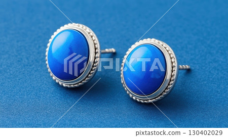 Elegant Lapis Lazuli Earrings Showcasing Vivid Blue Color Against a Smooth Background for Sophisticated Fashion Accessory 130402029