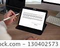 Digital signature concept with a person using a 130402573