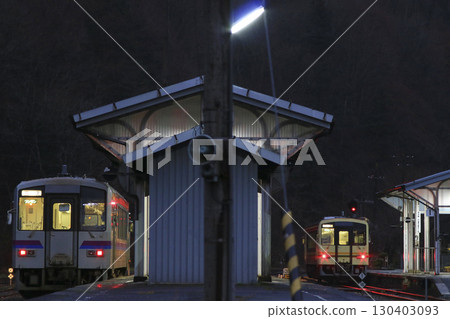 Kiha local train running on a local line at night Kiha local train running on a local line at night 130403093