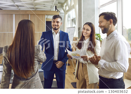Business people standing in office making successful shaking hands finishing meeting. 130403632