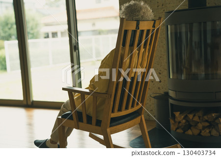 Elderly people spend the rest of their lives rocking in rocking chairs 130403734