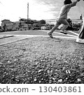 A child skipping on a walk 130403861