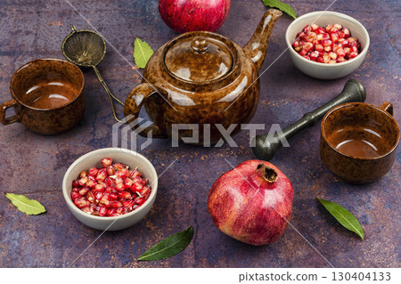 Fresh pomegranate juice or tea. Fresh pomegranate juice or tea. 130404133