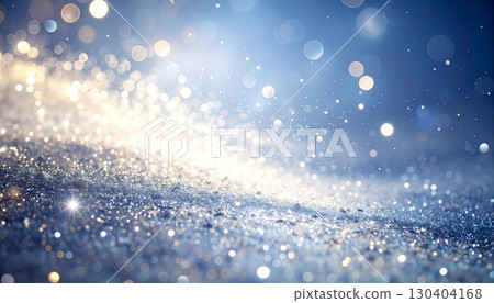 A fantastical background with soft blue bokeh and sparkle that can be used for Christmas, weddings, fashion, and cosmetics. 130404168