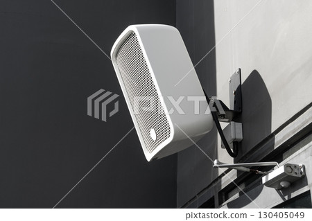 Outdoor Speaker System installed at balcony wall backyard exterior music audio system public park Outdoor Speaker System installed at balcony wall backyard exterior music audio system public park 130405049