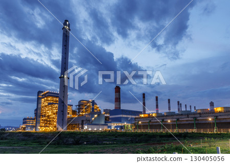 Power plant building, Heavy industry complex gas oil tower building at night time 130405056