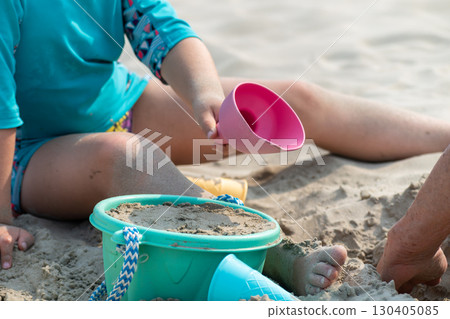 Child playing on a beach, good activity and sport for health and mental health 130405085