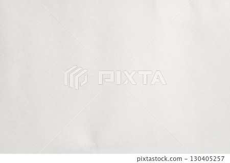 Blank white paper texture with subtle fibers and natural shadows creating Blank white paper texture with subtle fibers and natural shadows creating 130405257