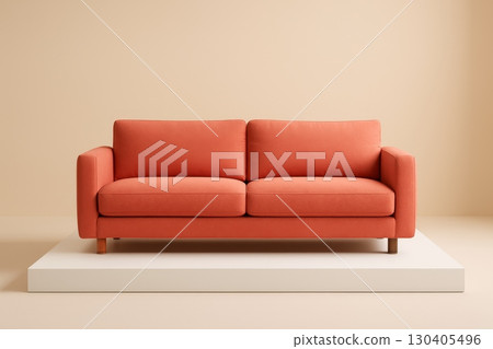 Coral modern sofa on white platform against beige background 130405496